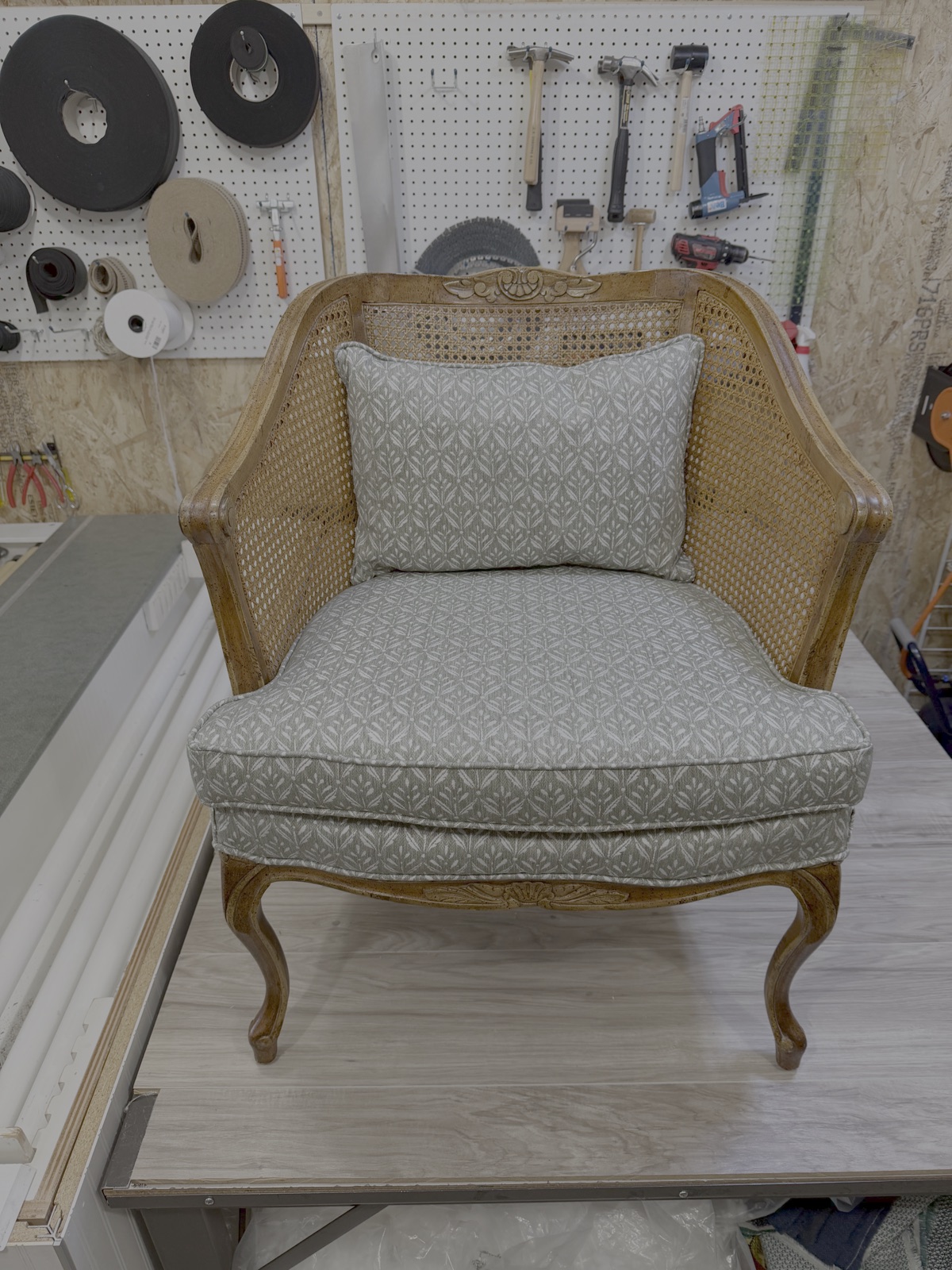 Caned barrel chair after reupholstery
