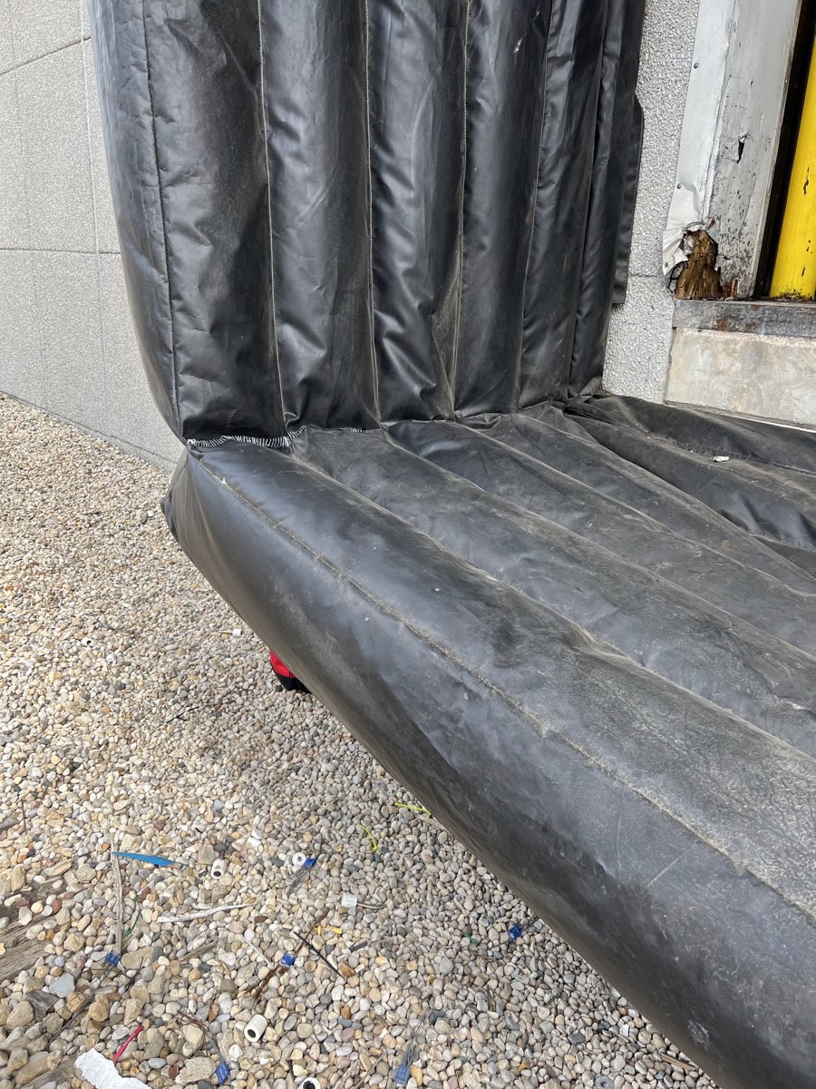 The same loading dock seal after the split seam was re-sewn