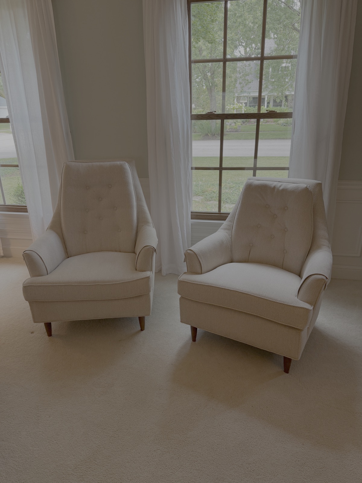 Pair of lounge chairs after reupholstery